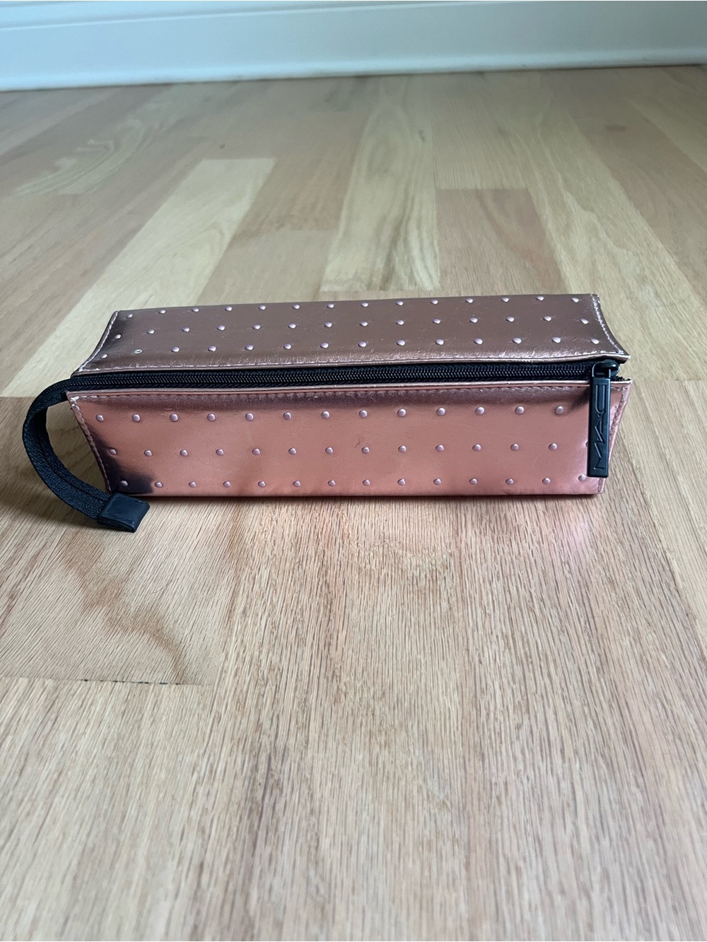 MAC Cosmetics black zipper pull with rose tan pouch detail